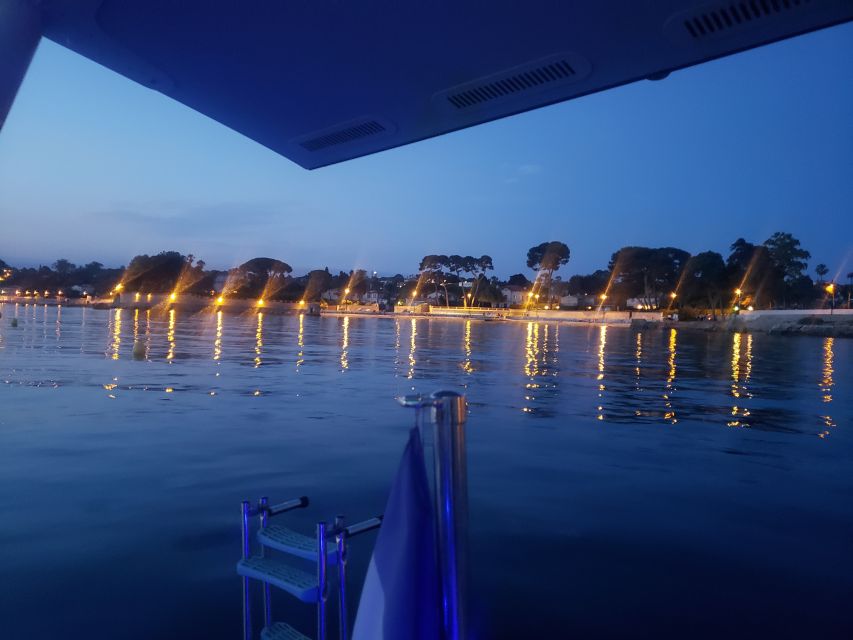 Private catamaran trip in the Bay of Juan les Pins at sunset - Cap d’Antibes villas and Hotel du Cap-Eden-Roc
