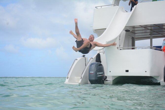 Private Catamaran with Sound system, Slide, Open bar & Snorkeling - Who will enjoy this catamaran most