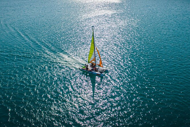Private Eco-Tour on a Recreational Catamaran with Kayaks Included - Swimming in clear water, with kayaks ready