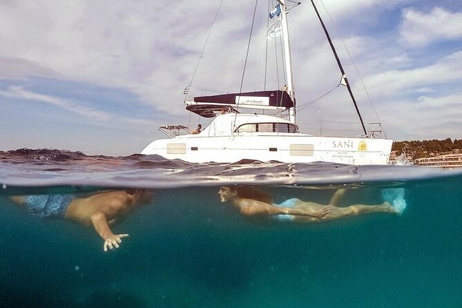 Private Full Day Cruise in Corfu on Lagoon Catamaran - Agni Beach: a harbor stop with lunch beside the water