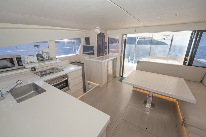 Private Half-Day Luxury Catamaran Experience - Pickup, timing, and cruise-port planning