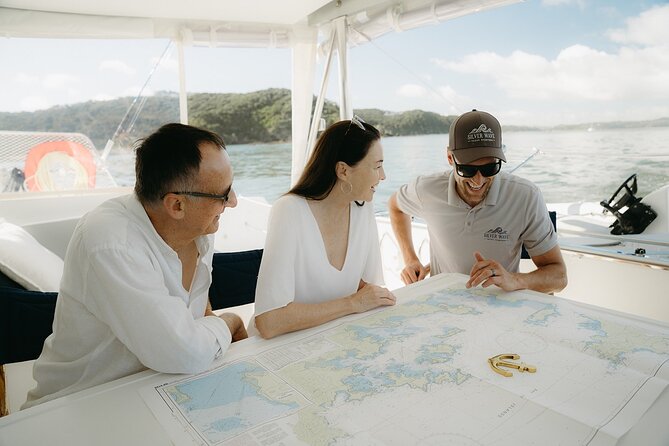 Private Luxury Sailing Catamaran Charter in the Bay of Islands - Taking the wheel and helping with the sails