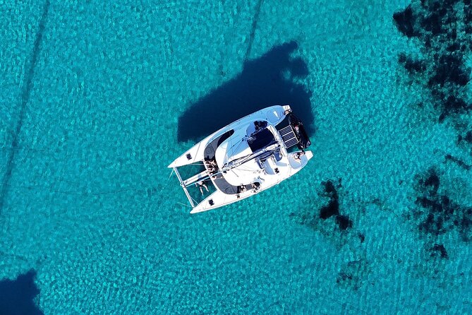 Private Mykonos Catamaran Day Cruise with Meals & Water Toys - Ornos gives the cruise a practical start