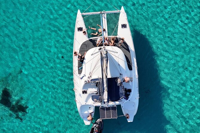 Private Mykonos Catamaran Day Cruise with Meals & Water Toys - Delos adds a historical side to the sailing day