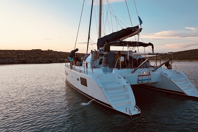 Private Mykonos Catamaran Day Cruise with Meals & Water Toys - Swimming, snorkeling, and water toys
