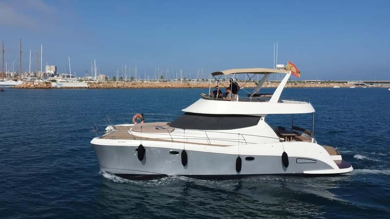 Puerto del Carmen: Private Sunset Catamaran Tour with Drinks - Watching the sun disappear behind Los Ajaches