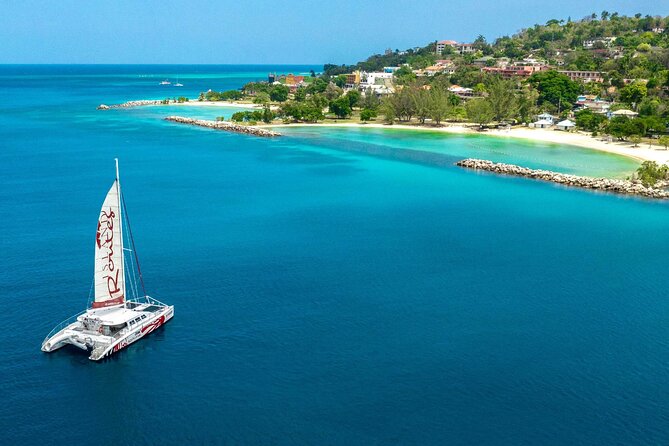 Reggae Catamaran and Snorkeling Open Bar Cruise Montego Bay - Doctor’s Cave Beach and the 40-Minute Snorkel Stop