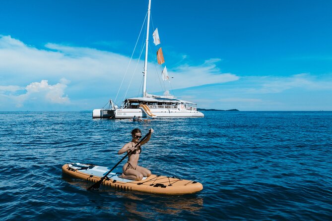 Rhapsody Phuket Coral & Racha Sunset Catamaran Cruise - Sunset near Promthep Cape at 17:20