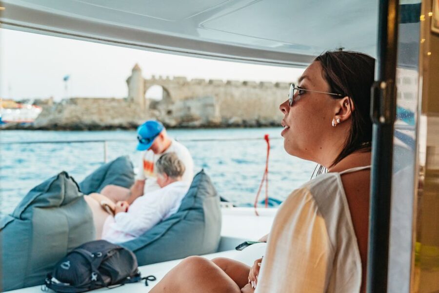 Rhodes: Sunset Catamaran Cruise with Dinner Buffet & Drinks - Unlimited Drinks and a Relaxed Onboard Mood