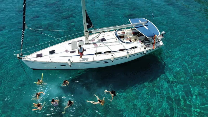 Rhodes: Sunset Catamaran Cruise with Snack, Fruits & Drinks - Sunset near Elli Beach