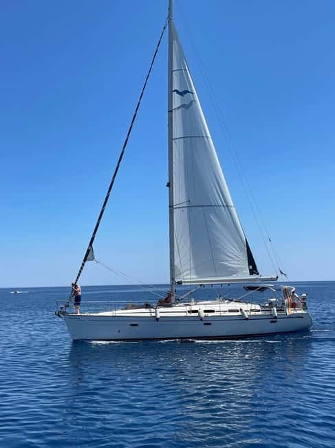 Rhodes: Sunset Catamaran Cruise with Snack, Fruits & Drinks - Weather, comfort, and a few drawbacks