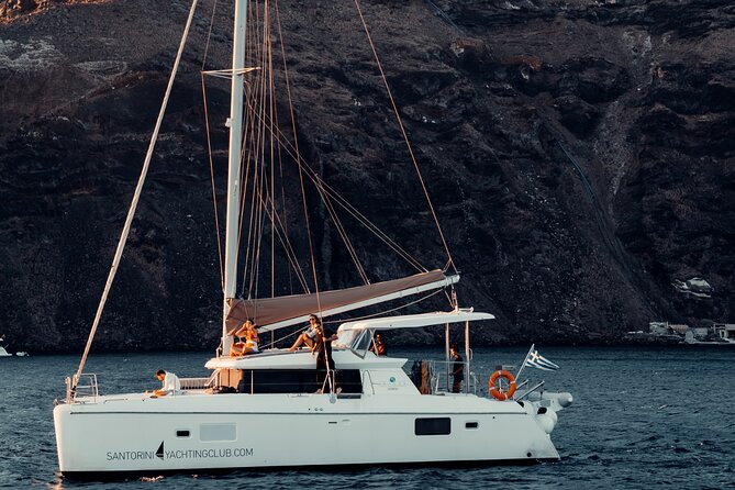Romantic Sunset Catamaran Caldera Cruise incl. Meal & Drinks - Pickup, departure, and the long Santorini afternoon