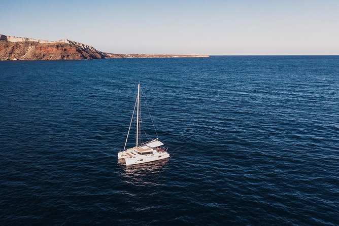 Romantic Sunset Catamaran Caldera Cruise incl. Meal & Drinks - Oia sunset from Ammoudi Bay