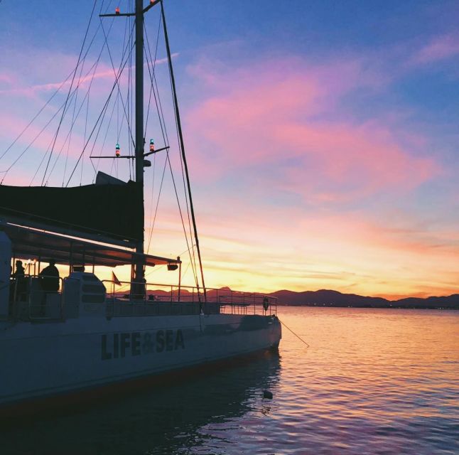 S'Arenal: Sunset Catamaran Cruise with BBQ - The swim stop near Cap Enderrocat and Cala Vella