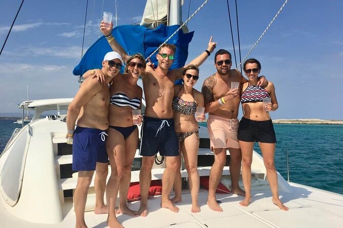 Sailing Catamaran Party to Isla Mujeres from Cancun - Trying spinnaker flying above the sea