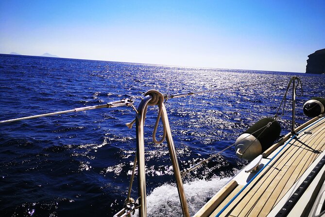 Sailsational Luxury Santorini Catamaran Sunset Cruise with Dinner - Mesa Pigadia, swimming, and dinner at sunset