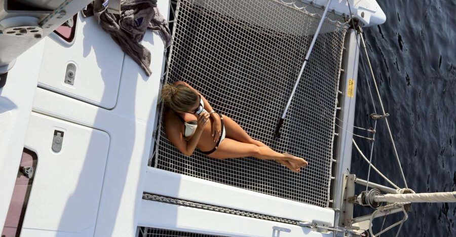 Santorini: 7-Hour Private Catamaran Cruise with Food & Drink - Leaving Vlychada Marina for the southern coast