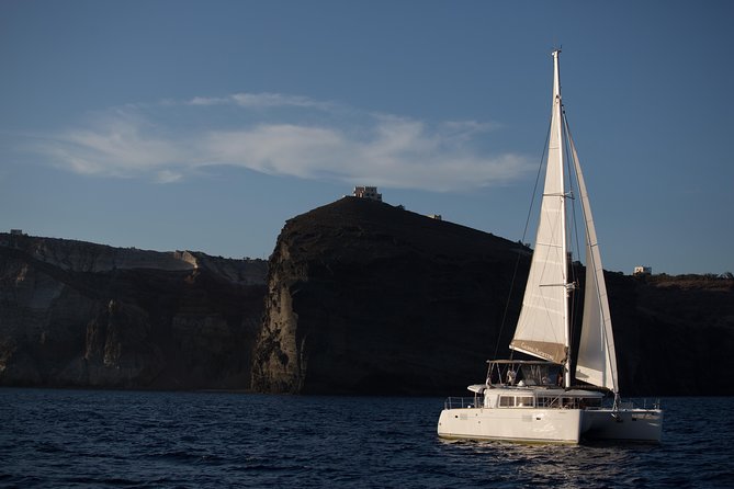 Santorini:All-inclusive Catamaran Cruise with Thirassia Stop - From Fira to Vlichada, the cruise begins in the south