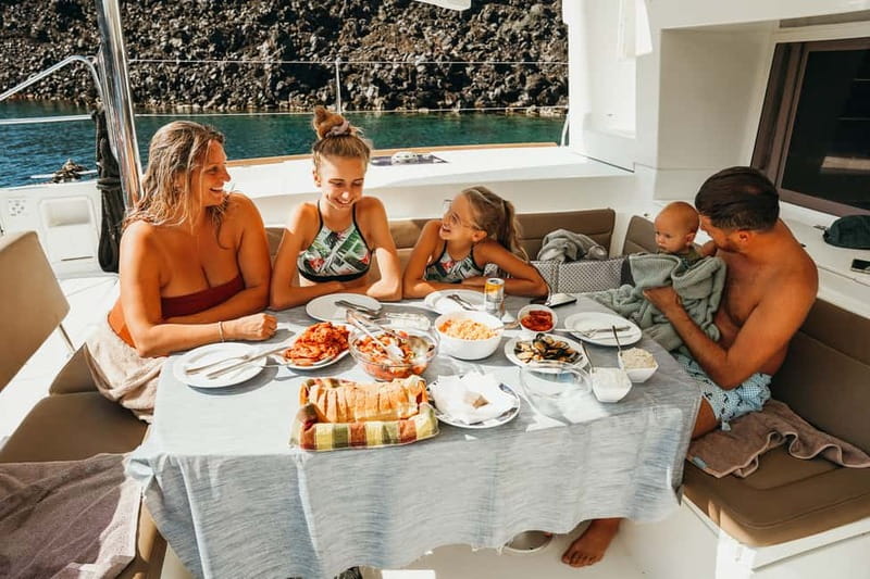 Santorini: All-Inclusive Private Catamaran Experience - Choosing between the day and sunset cruise