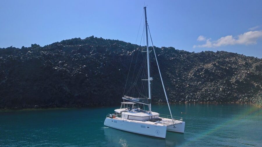 Santorini: Caldera Luxury Catamaran Cruise w/ Meal & Drinks - Nea Kameni: black lava, salt water, and lunch