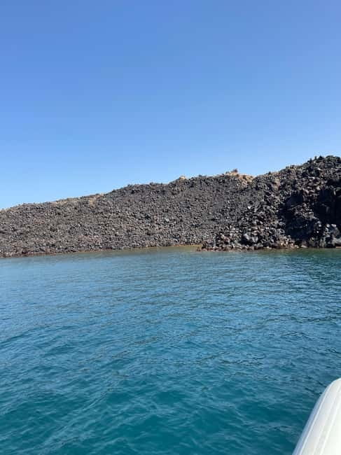 Santorini: Catamaran Cruise with Food and Drinks - The crew sets the tone, from safety talk to music
