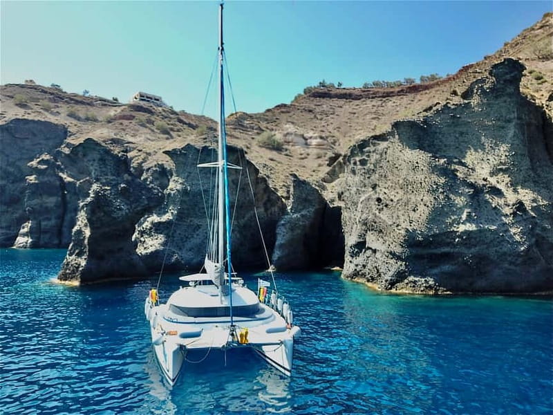 Santorini: Catamaran Cruise with Food and Drinks - Day cruise or sunset cruise?