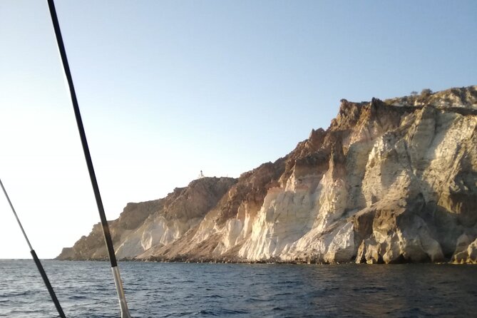 Santorini Catamaran Cruise with Fresh Meal and Open Bar - Cruising around the Santorini volcano