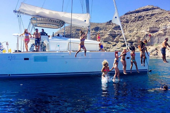 Santorini Catamaran Cruise with Fresh Meal and Open Bar - A fresh meal and an open bar on deck