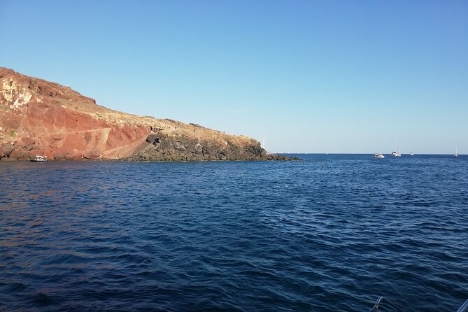 Santorini Catamaran Cruise with Fresh Meal and Open Bar - Swimming at the Palea Kameni hot springs