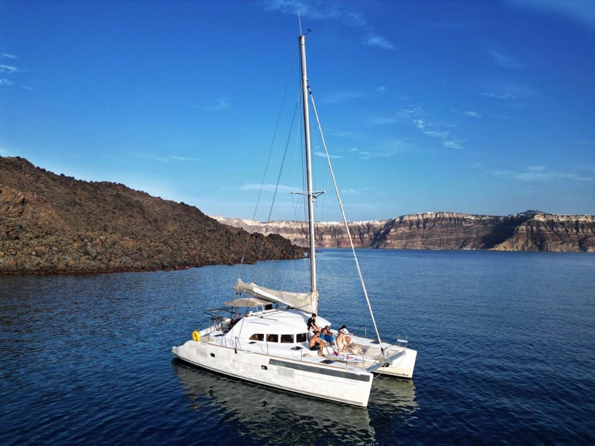 Santorini: Catamaran Cruise with Greek BBQ and Drinks - Why Santorini looks better from a catamaran