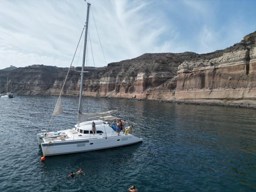 Santorini: Catamaran Cruise with Greek BBQ and Drinks - Mesa Pigadia for a final swim
