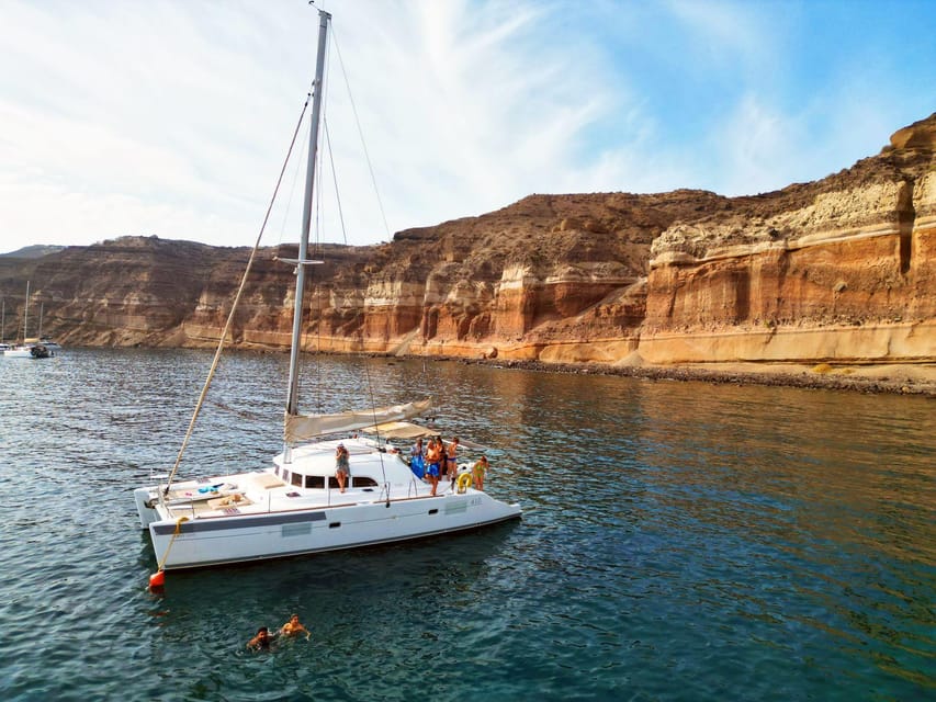 Santorini: Catamaran Cruise with Greek BBQ and Drinks - Leaving Vlychada Marina