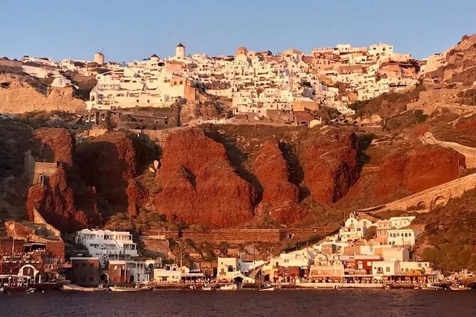 Santorini Catamaran Cruise with Greek Meal, Open-Bar and Sunset - Hotel pickup and the parts that require patience
