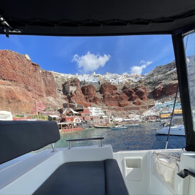 Santorini: Catamaran Cruise with Lunch, Drinks, & Oia Visit - The lighthouse, White Beach, and Red Beach
