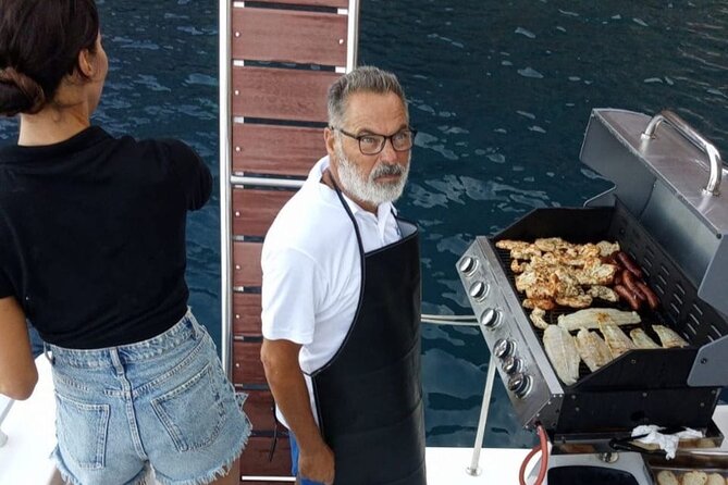Santorini Catamaran Cruise with Meal and Drinks - Ellie’s Greek meal onboard