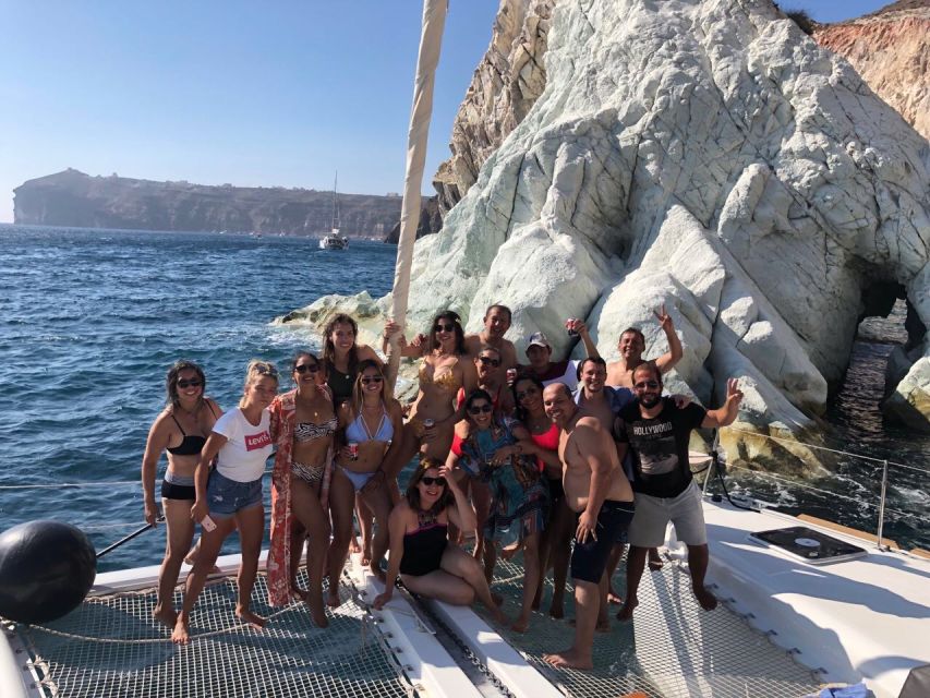 Santorini: Catamaran Cruise with Meal & Open Bar - Sunset, music, and the ride back