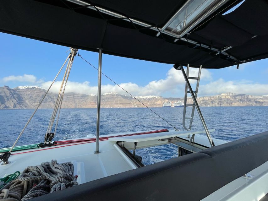Santorini Catamaran Cruise with Swimming, Meal and Open Bar - Thirassia, the main stop for swimming and lunch