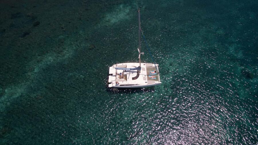 Santorini:Catamaran: private cruise with food & drinks - Old Volcano and the Hot Springs lunch stop