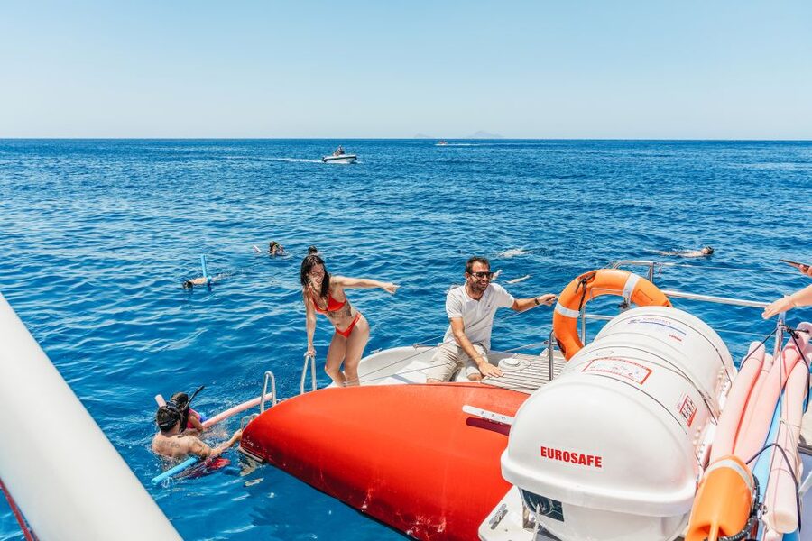 Santorini: Catamaran Tour with BBQ Dinner, Drinks, and Music - Key points to know before you book