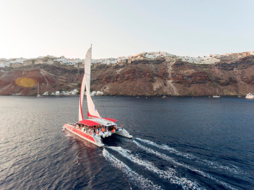 Santorini: Cruise Catamaran with BBQ & Drinks Day or Sunset - Choosing the morning or sunset departure