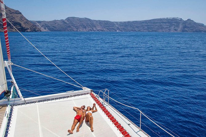 Santorini Cruise on Catamaran with BBQ & Open Bar - A five-hour cruise through Santorini’s caldera