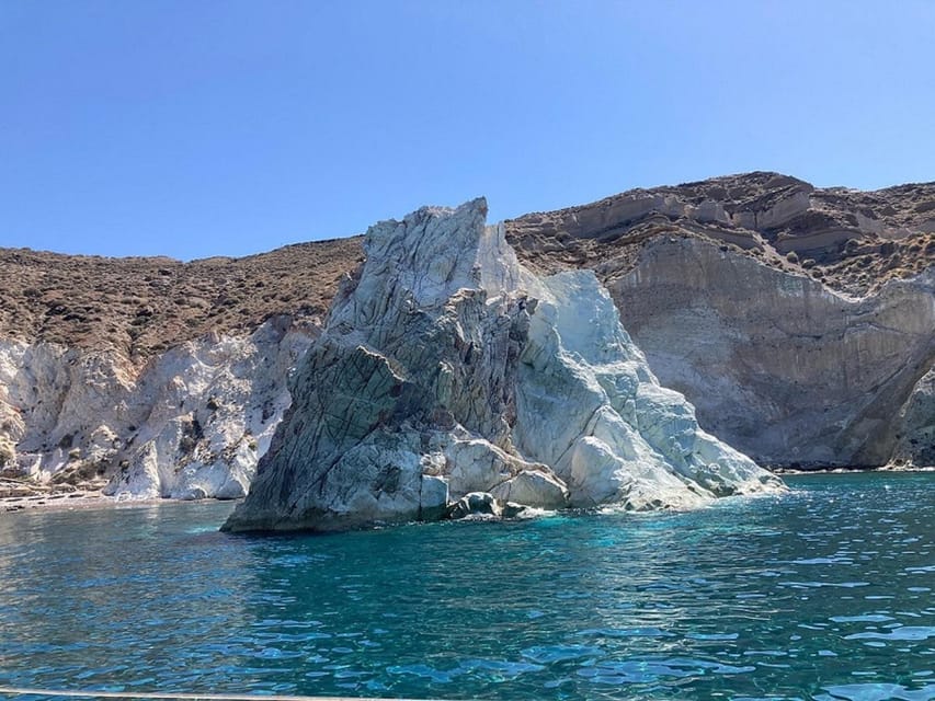 Santorini:Cruises with Catamaran around the Volcanic Island. - Red Beach gives you Santorini’s boldest colors