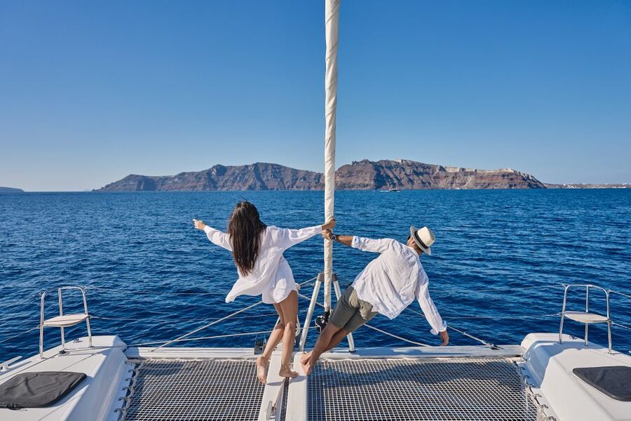 Santorini: Day Luxury Catamaran Cruise with Meal & Drinks - Black lava and the volcanic islets