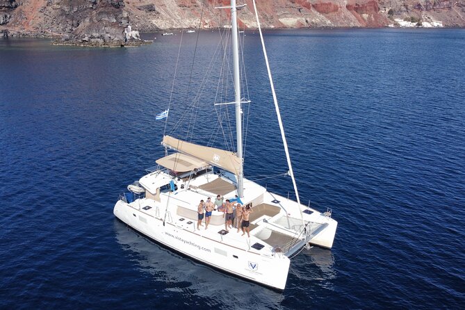 Santorini Gold Catamaran Cruise with BBQ, Drinks and Hotel Pickup - Leaving from Vlichada on Santorini’s southern coast