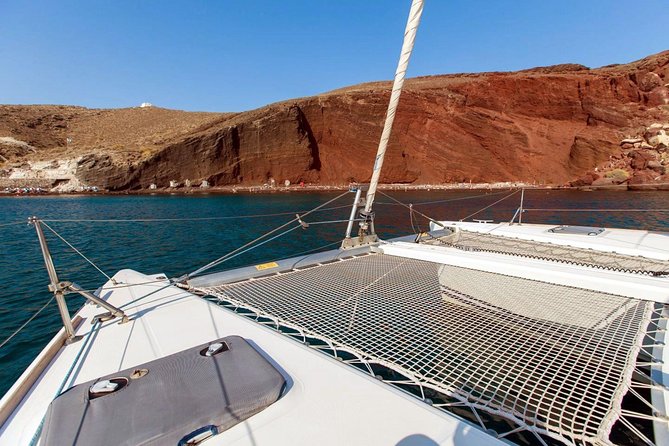 Santorini Half Day Catamaran Private Cruise incl. Meal, Drinks & Free Transport - Mesa Pigadia, the best pause for a swim