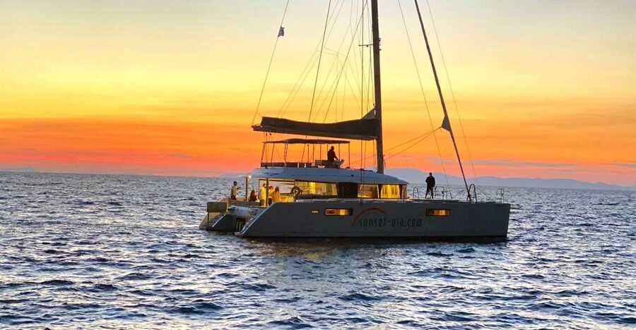 Santorini: Luxurious Catamaran Cruise with Meal & Open Bar - Warm water at the Palea Kameni hot springs