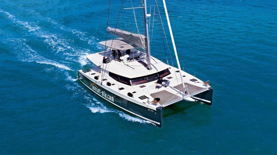 Santorini: Luxurious Catamaran Cruise with Meal & Open Bar - Transport, timing, and the return to shore