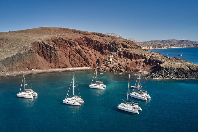 Santorini: Luxury Catamaran Cruise with Fresh Fish BBQ & Drinks - White Beach and Mesa Pigadia’s Clear Water