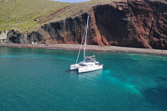 Santorini: Luxury Catamaran Cruise with Fresh Fish BBQ & Drinks - Nea Kameni and the Meal on Board