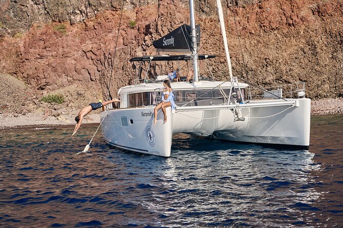 Santorini: Luxury Catamaran Cruise with Fresh Fish BBQ & Drinks - Sunset, Dinner, and the Ride Home